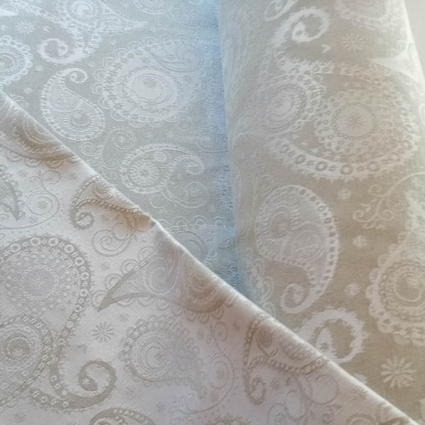 Meterware Beige mit creme Ornamenten