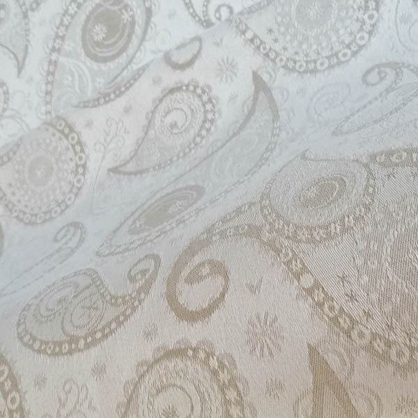 Meterware Creme mit beige Ornamenten