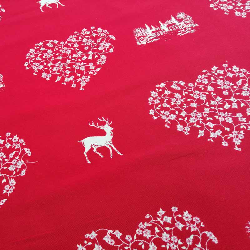 Stoff Hirsch mit Herzen creme - Hintergrund rot Stoff Hirsch mit Herzen creme - Hintergrund rot