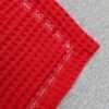 Kissen aus Waffelstoff rot Blumenkante